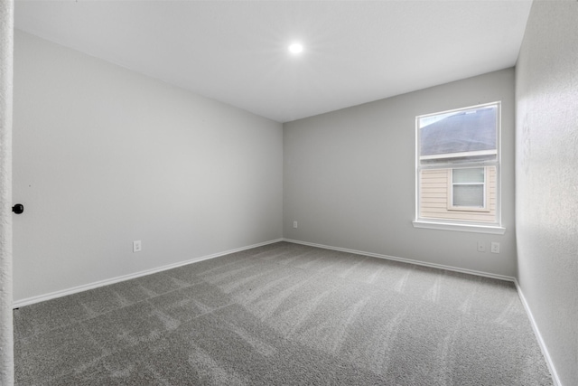 9987 Sterling Place Dr, Conroe, TX 77303 - carpeted empty room with baseboards