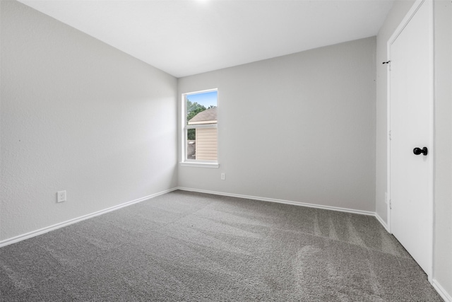 9987 Sterling Place Dr, Conroe, TX 77303 - empty room with carpet floors and baseboards