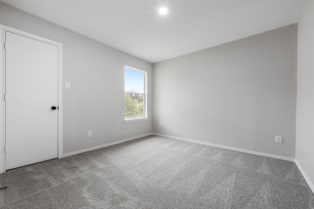 9987 Sterling Place Dr, Conroe, TX 77303 - empty room with carpet flooring and baseboards