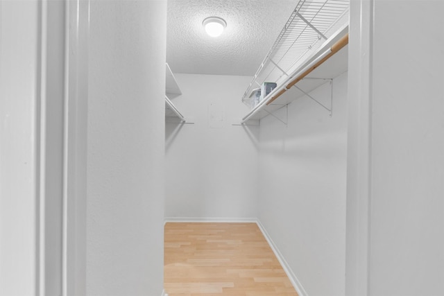 2800 Jeanetta St Unit 2502, Houston, TX 77063 - walk in closet with wood finished floors