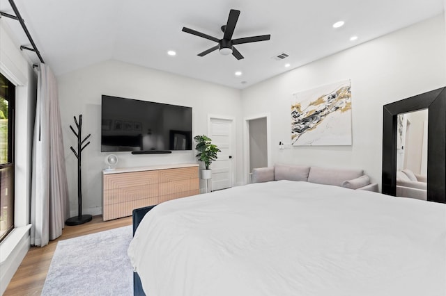10826 Moonlight Dr, Houston, TX 77096 - bedroom with wood finished floors, recessed lighting, ceiling fan, and vaulted ceiling