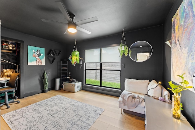 10826 Moonlight Dr, Houston, TX 77096 - sitting room featuring a ceiling fan and wood finished floors