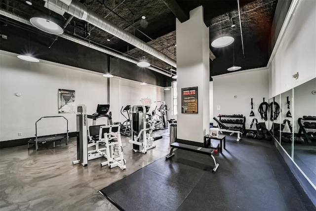 915 Franklin St Unit 2I, Houston, TX 77002 - workout area featuring a towering ceiling