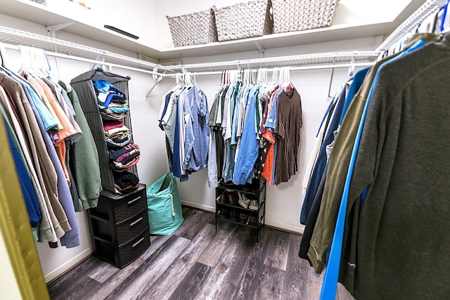 12223 Paddock Way, Houston, TX 77065 - walk in closet featuring wood finished floors