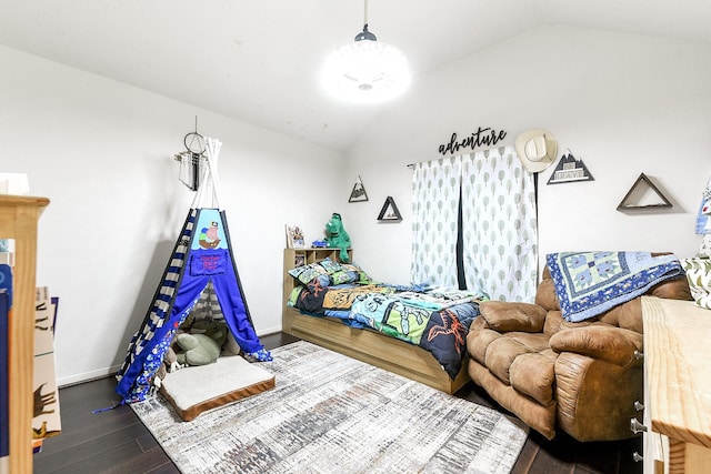 12223 Paddock Way, Houston, TX 77065 - bedroom featuring vaulted ceiling and dark wood-style floors