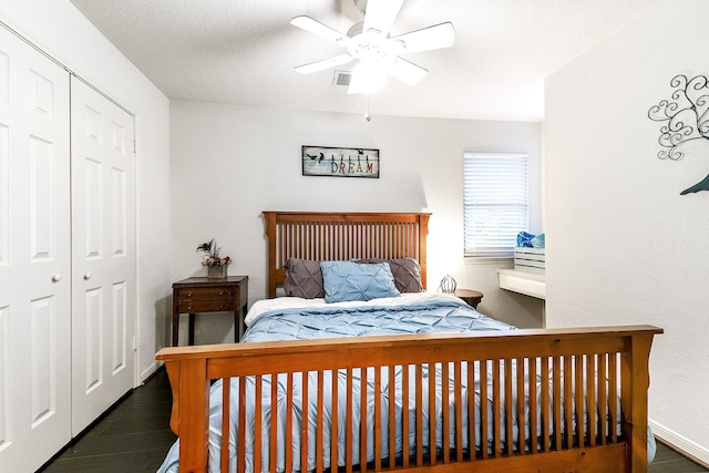 12223 Paddock Way, Houston, TX 77065 - bedroom featuring a closet and ceiling fan