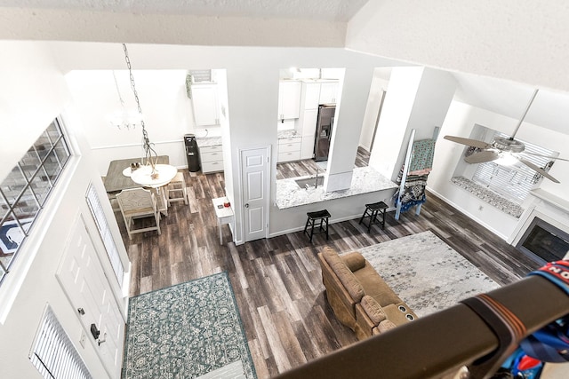 12223 Paddock Way, Houston, TX 77065 - living room with ceiling fan and dark wood-type flooring