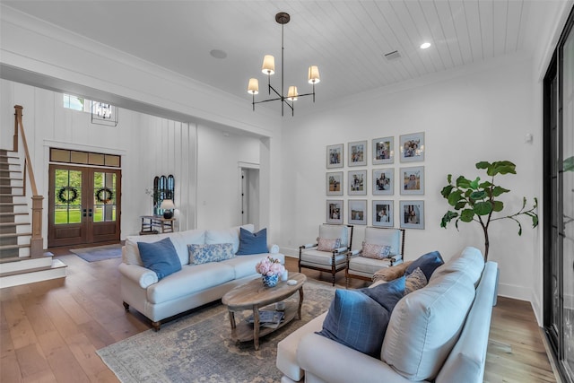 37732 Marias Way, Magnolia, TX 77354 - living area with a chandelier, stairway, hardwood / wood-style flooring, recessed lighting, and wooden ceiling