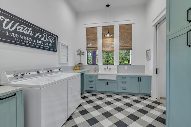 37732 Marias Way, Magnolia, TX 77354 - laundry room featuring cabinet space, separate washer and dryer, and light flooring
