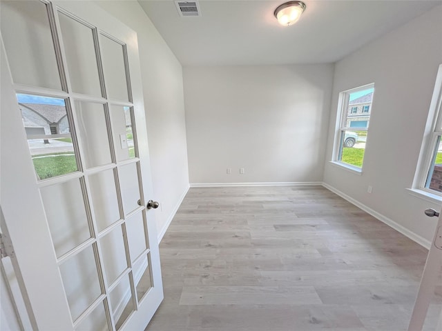 32402 Fly Fish Way, Fulshear, TX 77441 - empty room with light wood-style floors and baseboards