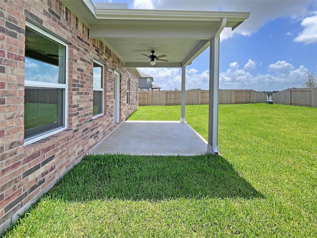 32402 Fly Fish Way, Fulshear, TX 77441 - fenced backyard featuring ceiling fan and a patio