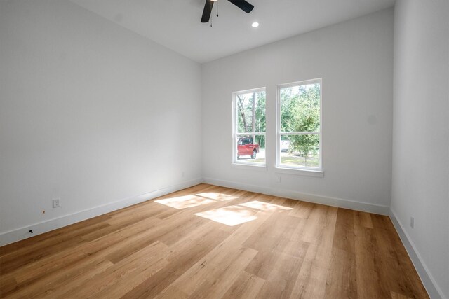 8703 Miller Rd, Magnolia, TX 77354 - unfurnished room with a ceiling fan, wood finished floors, and recessed lighting