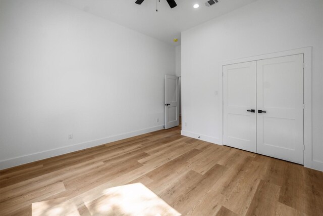 8703 Miller Rd, Magnolia, TX 77354 - unfurnished bedroom with light wood-type flooring, ceiling fan, a closet, and recessed lighting