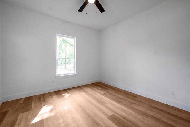 8703 Miller Rd, Magnolia, TX 77354 - unfurnished room featuring ceiling fan and light wood-style floors
