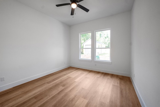 8703 Miller Rd, Magnolia, TX 77354 - unfurnished room featuring light wood-type flooring and a ceiling fan