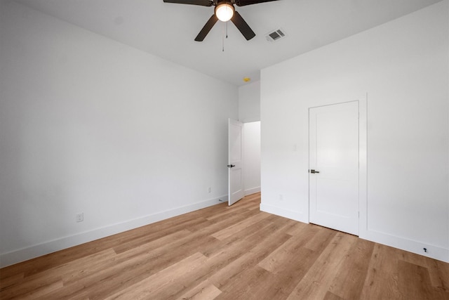 8703 Miller Rd, Magnolia, TX 77354 - unfurnished bedroom featuring light wood-style flooring and a ceiling fan