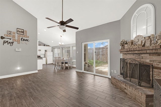 3018 Windy Royal Dr, Houston, TX 77045 - living room with ceiling fan, a fireplace, dark wood finished floors, high vaulted ceiling, and recessed lighting