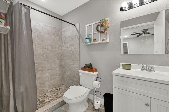 3018 Windy Royal Dr, Houston, TX 77045 - bathroom with vanity, a ceiling fan, and tiled shower
