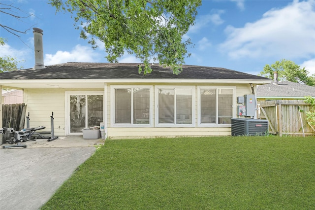 3018 Windy Royal Dr, Houston, TX 77045 - back of property with a chimney and a patio