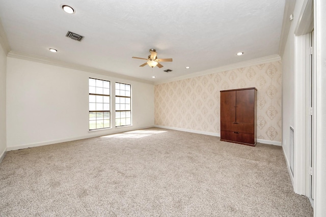 1743 Randons Point Dr, Sugar Land, TX 77478 - carpeted spare room featuring ornamental molding, a ceiling fan, recessed lighting, and wallpapered walls