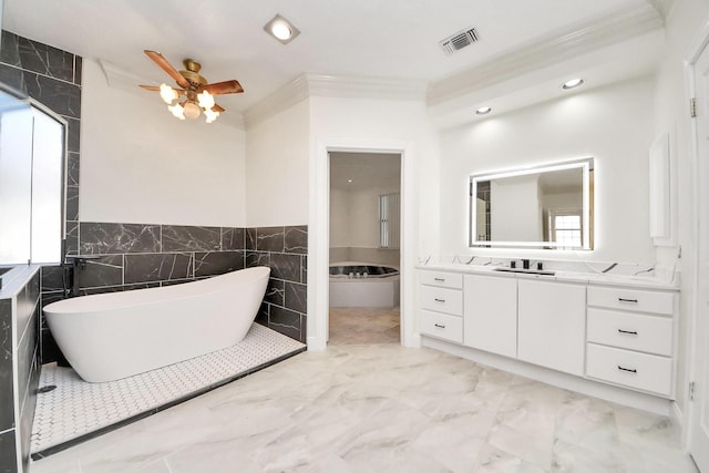 1743 Randons Point Dr, Sugar Land, TX 77478 - full bathroom featuring marble finish floors, a soaking tub, vanity, ornamental molding, and a ceiling fan