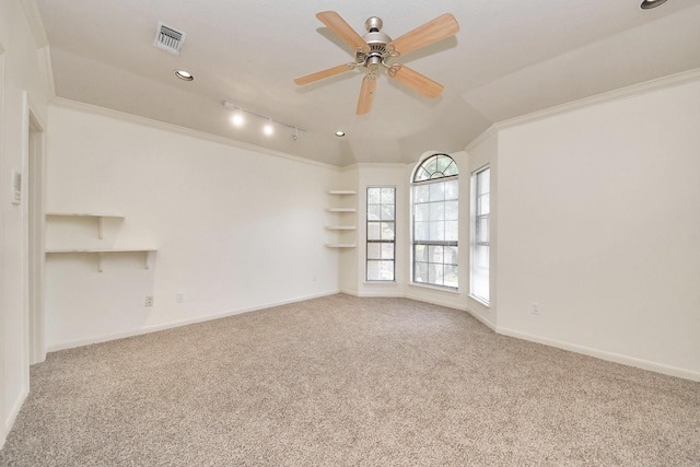 1743 Randons Point Dr, Sugar Land, TX 77478 - carpeted empty room featuring ceiling fan, built in shelves, rail lighting, recessed lighting, and crown molding
