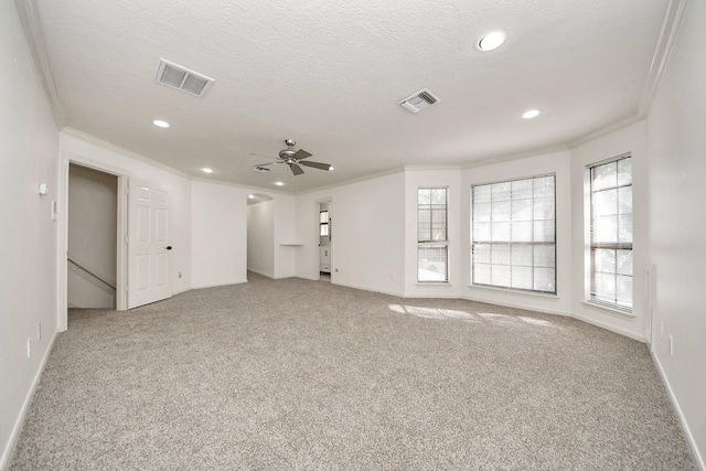 1743 Randons Point Dr, Sugar Land, TX 77478 - unfurnished living room featuring crown molding, carpet, a ceiling fan, recessed lighting, and a textured ceiling