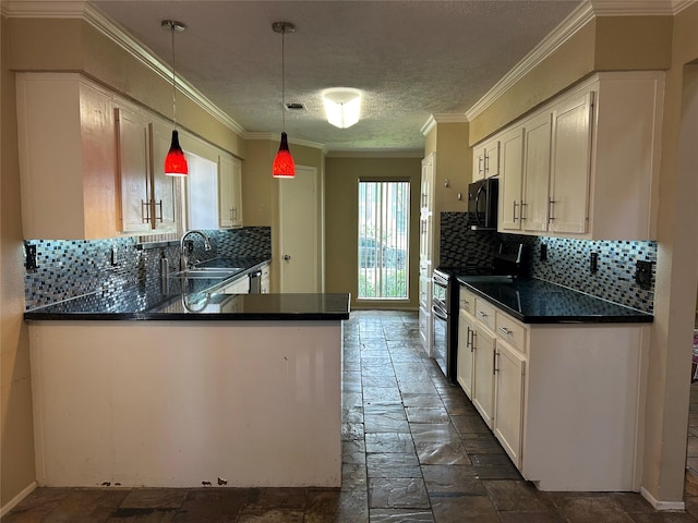 10007 Sagecourt Dr, Houston, TX 77089 - kitchen with stainless steel range with electric stovetop, black microwave, stone tile floors, dark countertops, and tasteful backsplash