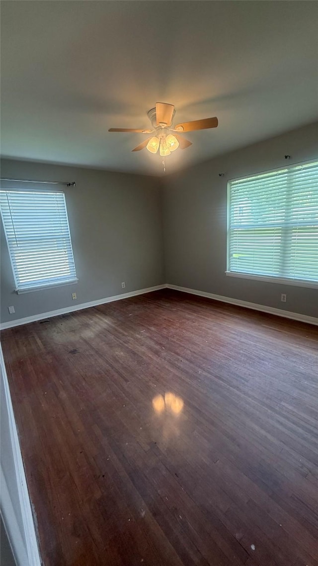 5580 Hooks Ave, Beaumont, TX 77706 - unfurnished room featuring dark wood-style flooring and ceiling fan