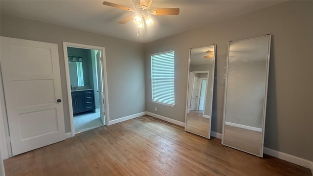 5580 Hooks Ave, Beaumont, TX 77706 - unfurnished bedroom with wood finished floors, ceiling fan, and ensuite bath