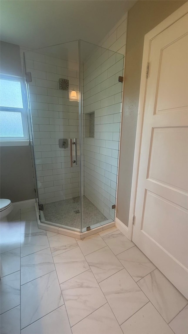 5580 Hooks Ave, Beaumont, TX 77706 - bathroom with baseboards and a shower stall