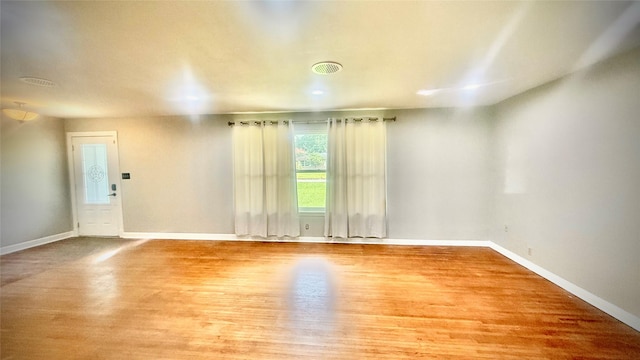 5580 Hooks Ave, Beaumont, TX 77706 - unfurnished room featuring wood finished floors and baseboards