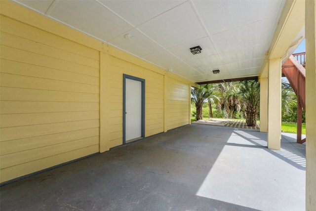 22517 Bay Point Dr, Galveston, TX 77554 - view of patio / terrace with a carport