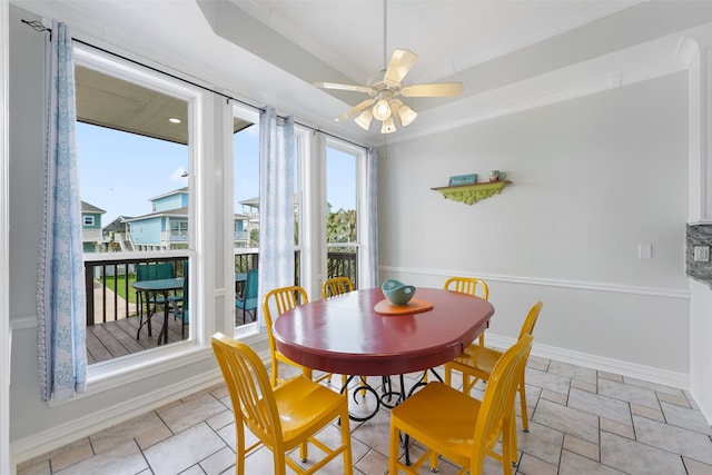 22517 Bay Point Dr, Galveston, TX 77554 - dining space with ceiling fan and baseboards