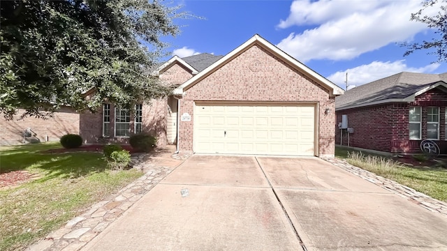 24714 Colonial Maple Dr, Katy, TX 77493 - view of front of house with brick siding, concrete driveway, an attached garage, and a front lawn