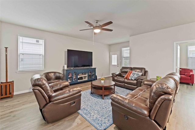 22006 Great Royal Ln, Houston, TX 77073 - living area with wood finished floors and ceiling fan