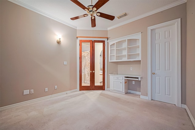 122 Marble Staff Ct, Houston, TX 77069 - unfurnished living room with french doors, light colored carpet, ceiling fan, and crown molding
