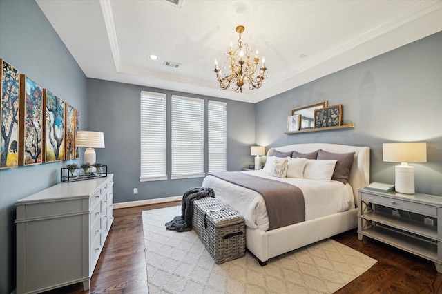 920 Lawrence St Unit D, Houston, TX 77008 - bedroom featuring a chandelier, a tray ceiling, dark wood-type flooring, and recessed lighting