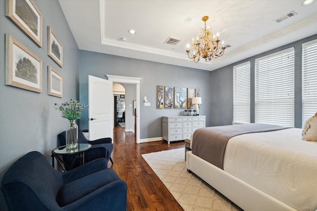 920 Lawrence St Unit D, Houston, TX 77008 - bedroom featuring a chandelier, wood finished floors, a tray ceiling, recessed lighting, and crown molding
