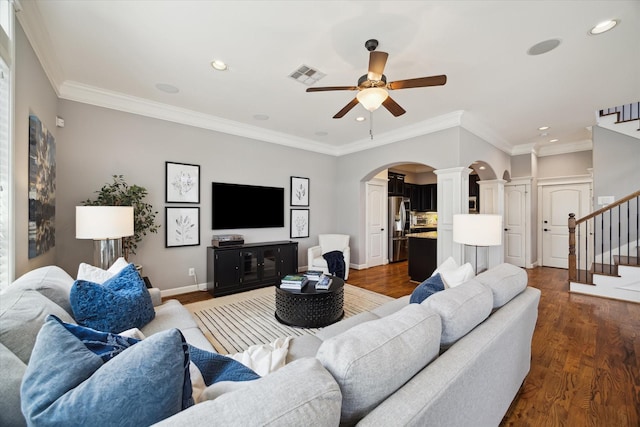 920 Lawrence St Unit D, Houston, TX 77008 - living room with ornate columns, arched walkways, ceiling fan, ornamental molding, and recessed lighting