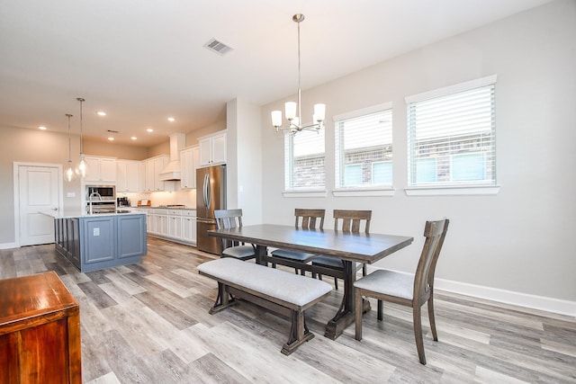 13910 Paseo De La Paz Pl, Cypress, TX 77433 - dining room with a chandelier, light wood-style floors, and recessed lighting