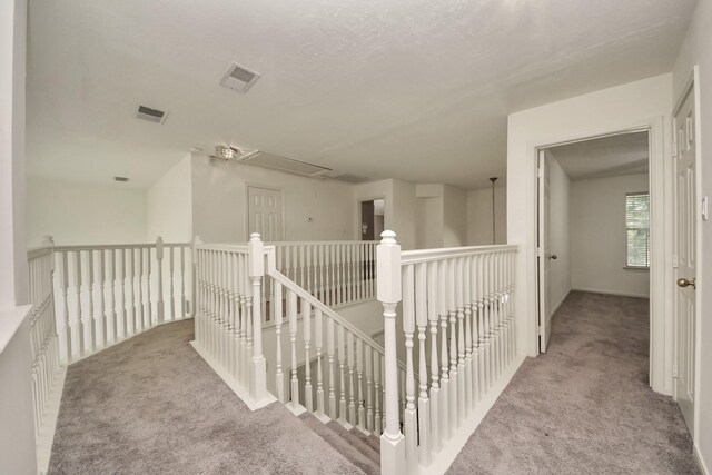 3622 Stratford Town Ln, Sugar Land, TX 77498 - hall with attic access, carpet, and an upstairs landing