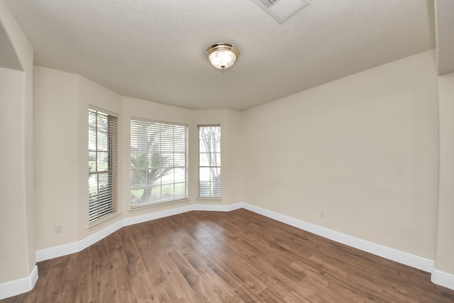 3622 Stratford Town Ln, Sugar Land, TX 77498 - empty room featuring dark wood-style flooring