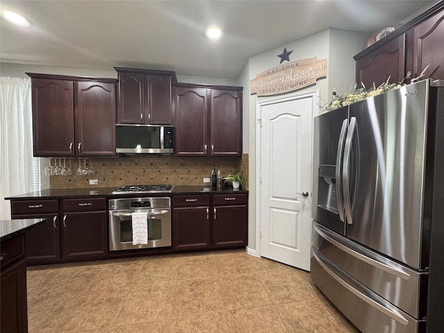 16506 Orchid Mist Dr, Cypress, TX 77433 - kitchen with stainless steel appliances, tasteful backsplash, dark brown cabinetry, light tile patterned floors, and recessed lighting