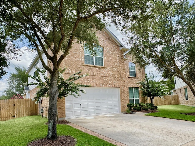 16506 Orchid Mist Dr, Cypress, TX 77433 - traditional-style house with a garage, brick siding, and driveway