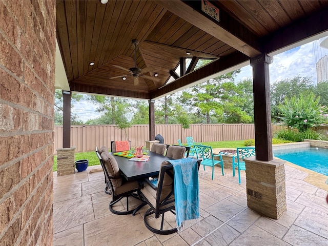 16506 Orchid Mist Dr, Cypress, TX 77433 - fenced backyard featuring a ceiling fan, a patio, and outdoor dining space