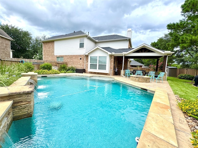 16506 Orchid Mist Dr, Cypress, TX 77433 - view of swimming pool featuring a patio area, an outdoor fire pit, and a fenced backyard