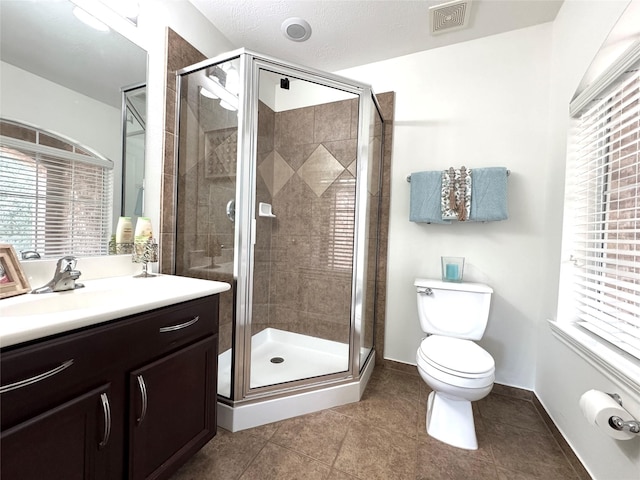 16506 Orchid Mist Dr, Cypress, TX 77433 - full bath featuring vanity, a shower stall, and tile patterned flooring
