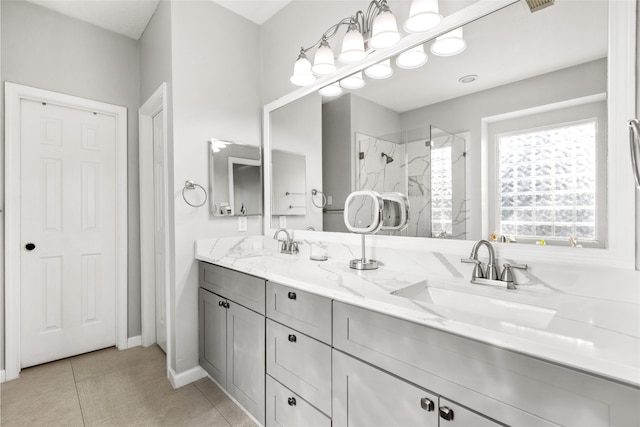 23602 Hawkins Creek Ct, Katy, TX 77494 - bathroom featuring a stall shower, double vanity, and tile patterned flooring