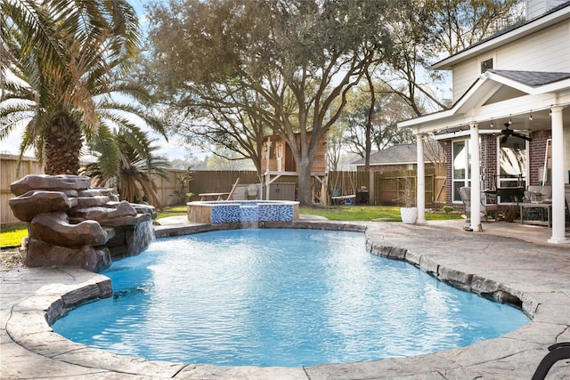 23602 Hawkins Creek Ct, Katy, TX 77494 - view of pool with ceiling fan, a fenced backyard, a pool with connected hot tub, and a patio area